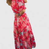 Minelda – Vestido florido com decote em V