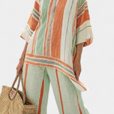 Elisabetta – top assimétrico elegante e calças de perna larga