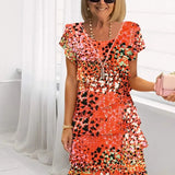 Brigitte – Vestido elegante e fluido com volantes