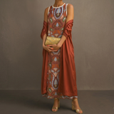 Daniela - Vestido longo com padrão floral e colete ajustado
